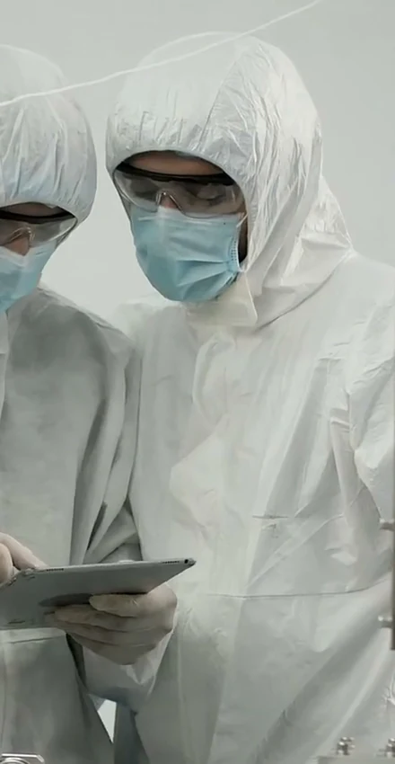 Raysun cleanroom team reviewing sterile manufacturing operations